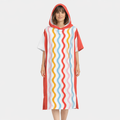 Poncho surf femme motifs vagues
