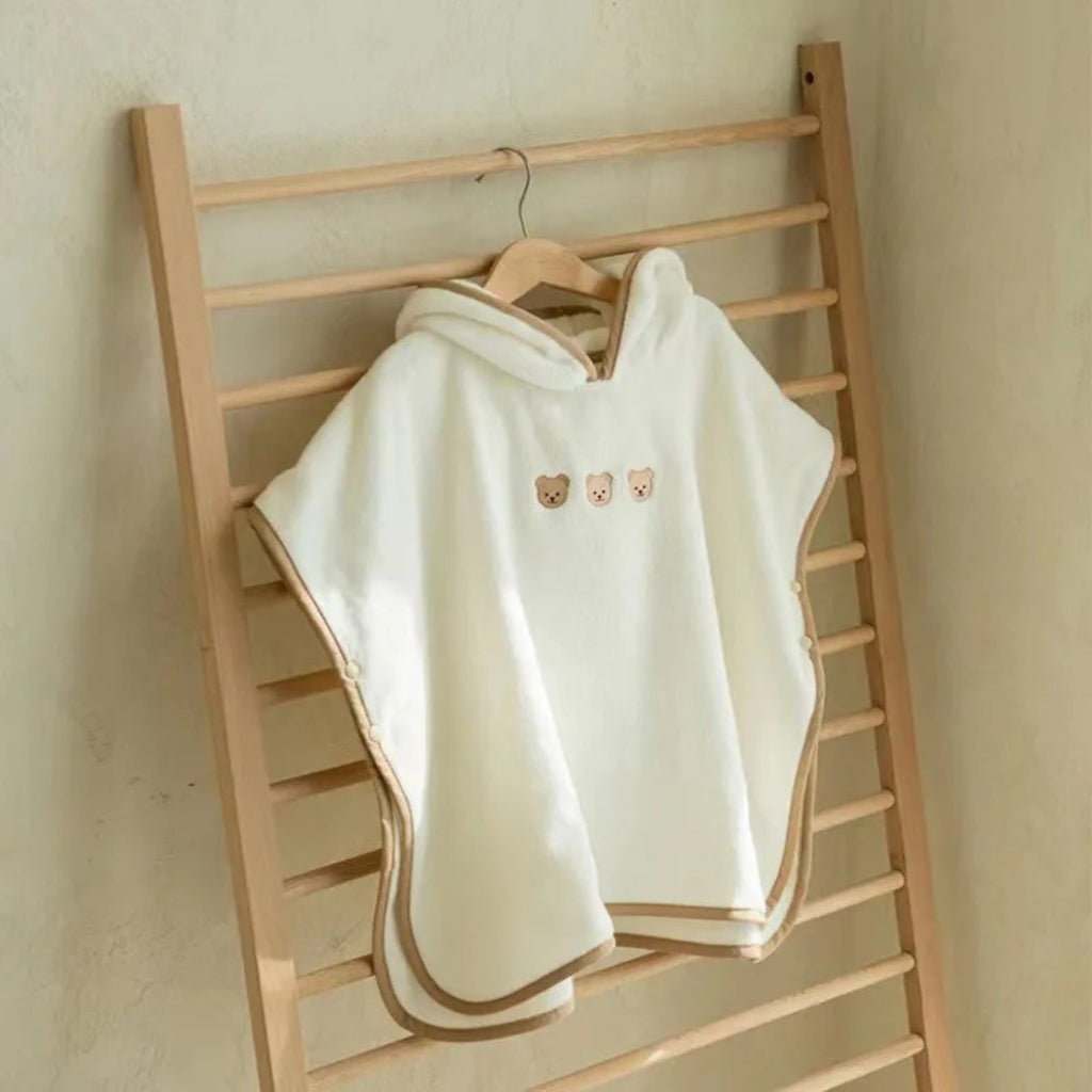 Poncho blanc bébé